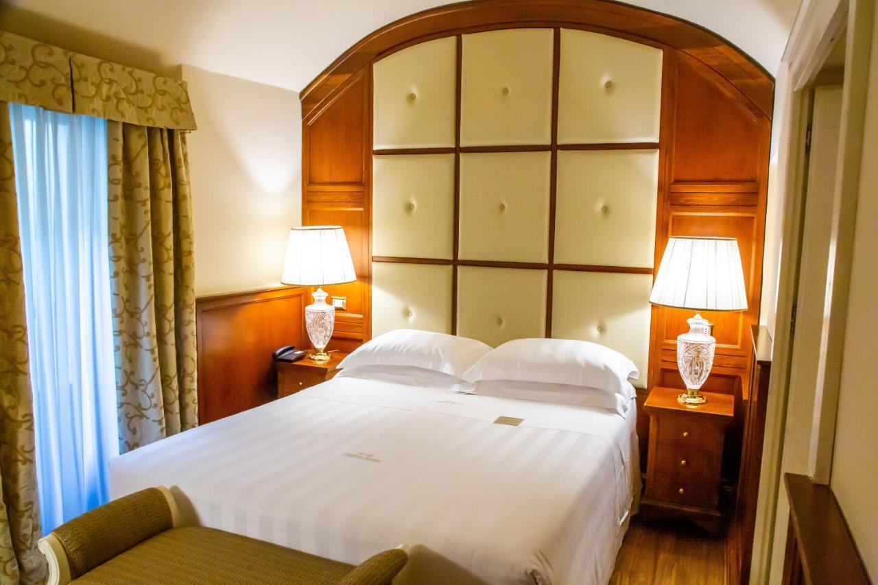 Golden Tower Hotel & Spa Florence Luaran gambar A bedroom at the hotel